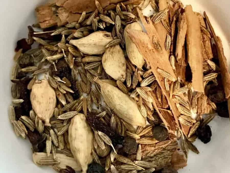 Overhead picture of whole spices used in Chicken Biryani recipe.