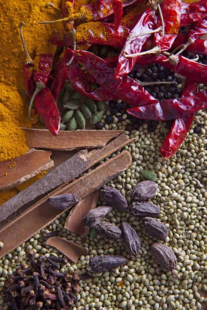 Raw ingredients for homemade garam masala recipe with various spices showing