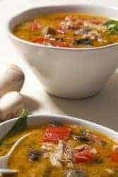 This is a recipe for Thai Yellow Curry Soup that uses curry paste, coconut milk and some fresh vegetables to provide a savory, comforting twist on regular chicken soup. This soup is well-spiced, but not spicy, and you can vary the spice level by adjusting how much yellow curry paste you choose to put into it.