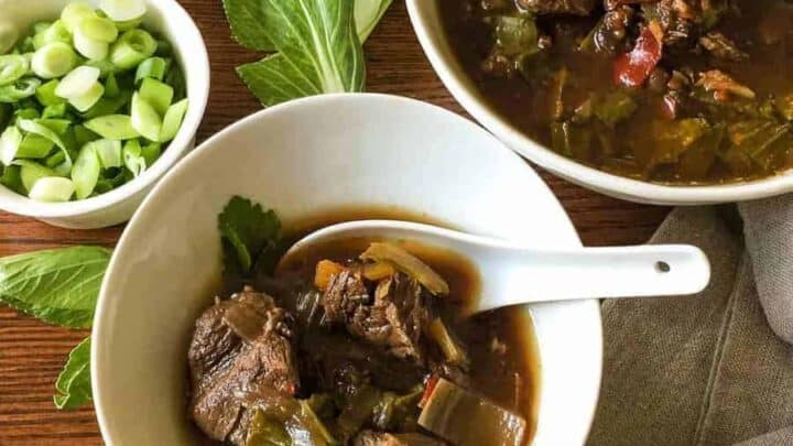 Flavorful, low carb version of Szechuan Pork Soup substitutes bok choy for the noodles, while keeping the traditional flavors of this soup. Pressure cooking makes the meat super tender.