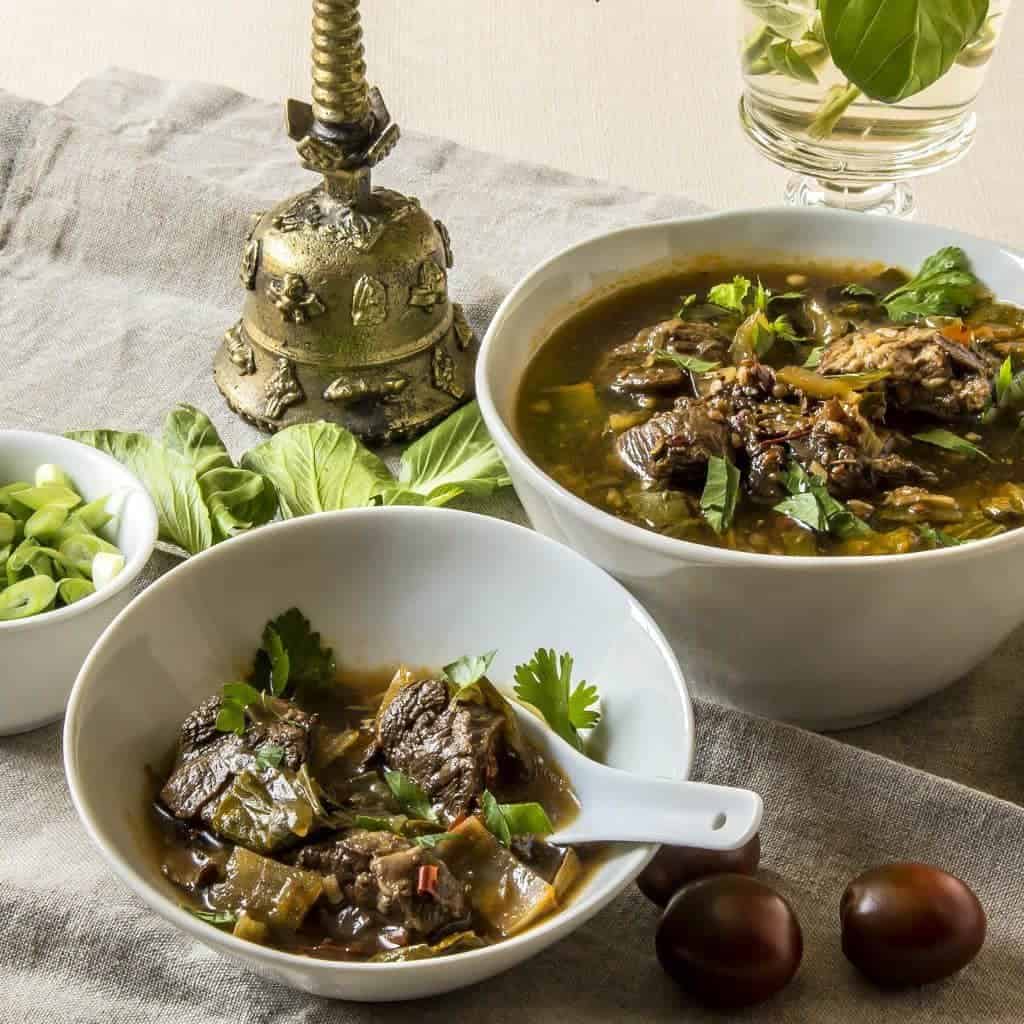 Flavorful, low carb version of Szechuan Pork Soup substitutes bok choy for the noodles, while keeping the traditional flavors of this soup. Pressure cooking makes the meat super tender. 