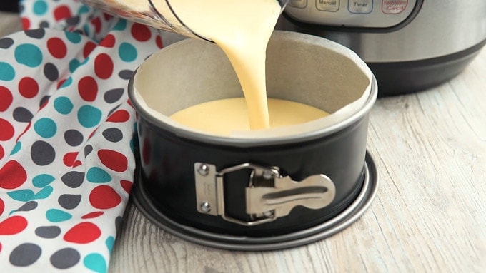 Side view of batter being poured into prepared pan
