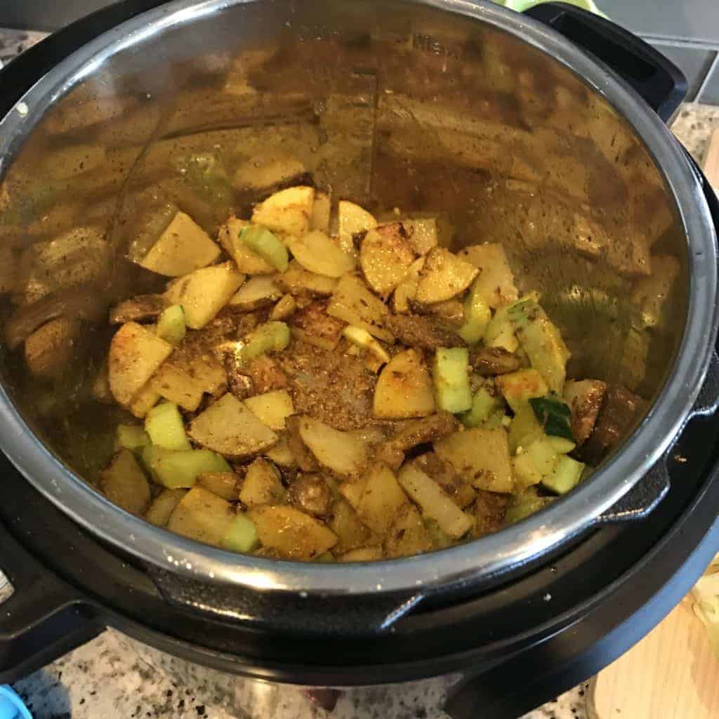 Perfect Punjabi-style Aloo Gobi from your pressure cooker or Instant Pot. Make this classic Indian vegan restaurant dish at home in minutes, without a lot of fuss. 
