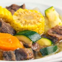 close up of caldo the des with vegetables