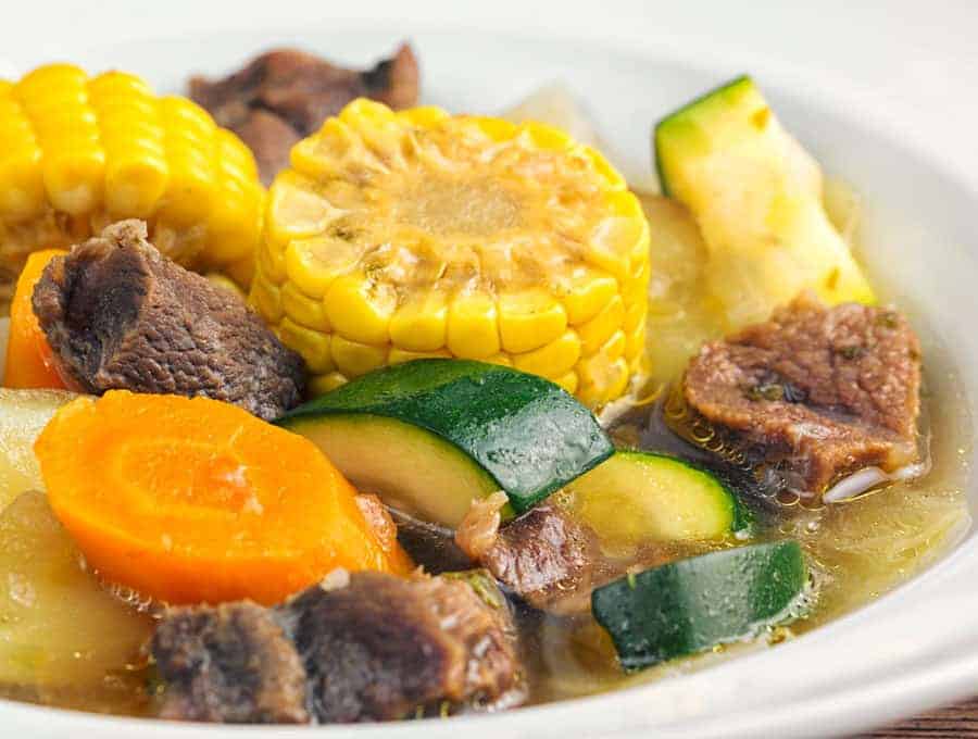 close up of caldo the des with vegetables