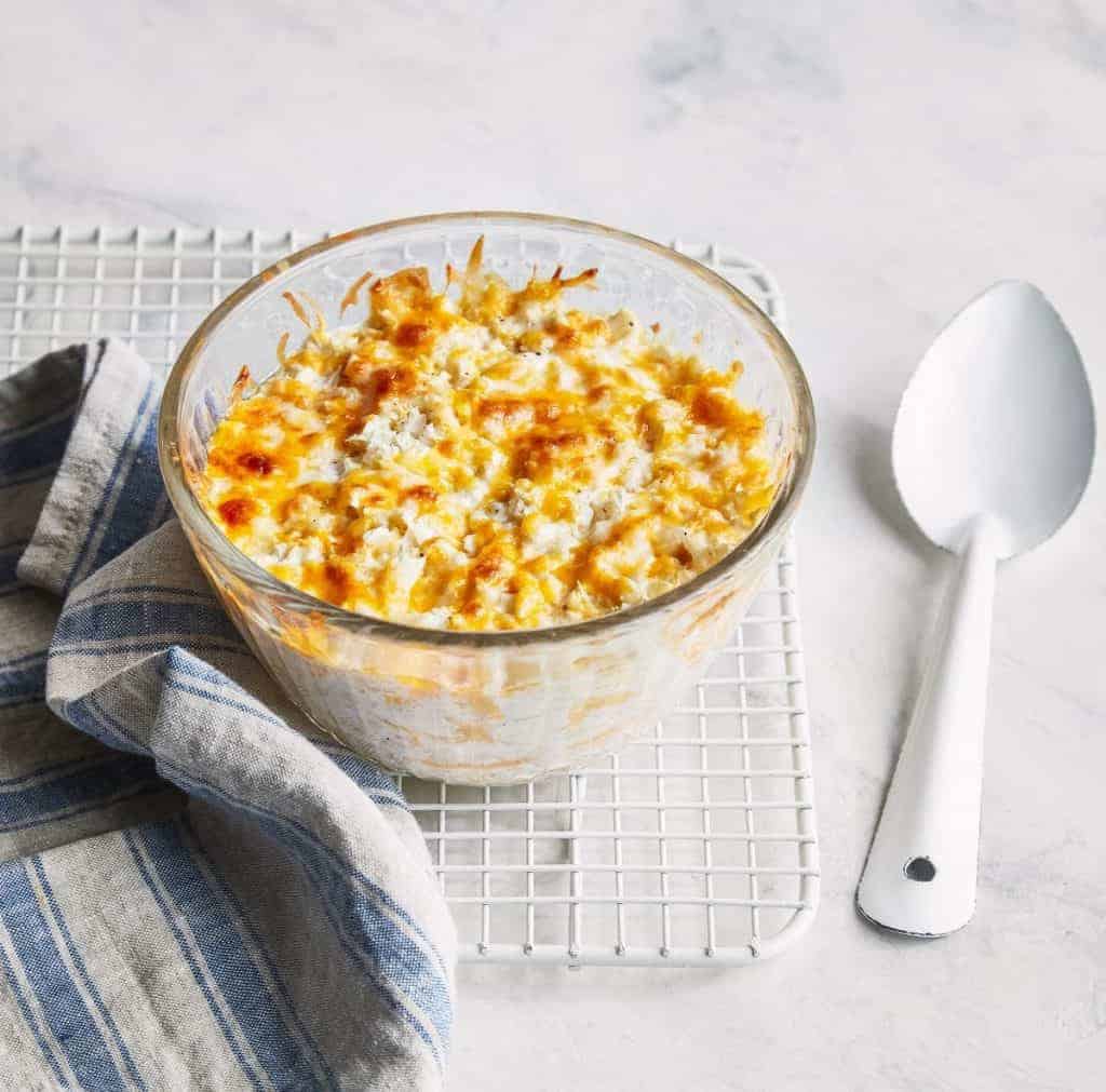 Instant Pot Low Carb Keto Cauliflower and Cheese is a creamy, delicious side dish that you can make in your pressure cooker for the ultimate low carb comfort food!