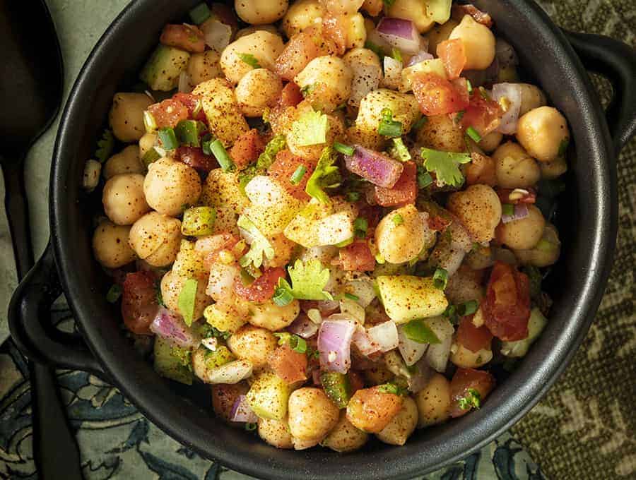 Chickpea Salad finished, served in a black bowl