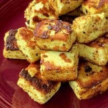 Low Carb Vegetarian Paneer tikka. Spiced paneer, panfried quickly in ghee for a savory, Indian snack. Find a recipe for homemade paneer as well at www.twosleevers.com