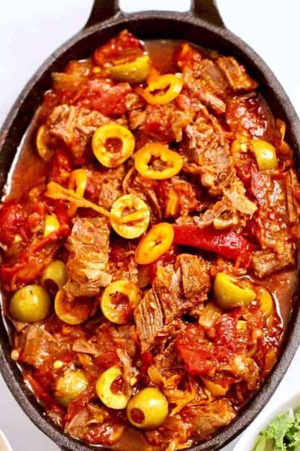 Instant Pot Cuban Rosa Vieja makes an almost effortless low carb mix of meat and vegetables in your pressure cooker. A colorful feast for the eyes as well as your tastebuds, make this dish with less than 10 minutes of prep time. This Ropa Vieja makes a lovely sauce to pour over rice, or to have with a side salad to serve a tasty, low-carb meal.
