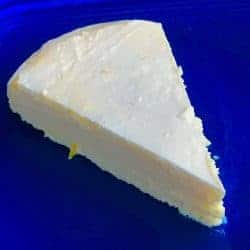 Instant Pot Keto Ricotta Lemon Cheesecake is a delicious low carb cheesecake with lemon zest for a little zing. Cook this in your pressure cooker to get a smooth and creamy cheesecake. Perfect for the summer when you don't want to turn on your oven