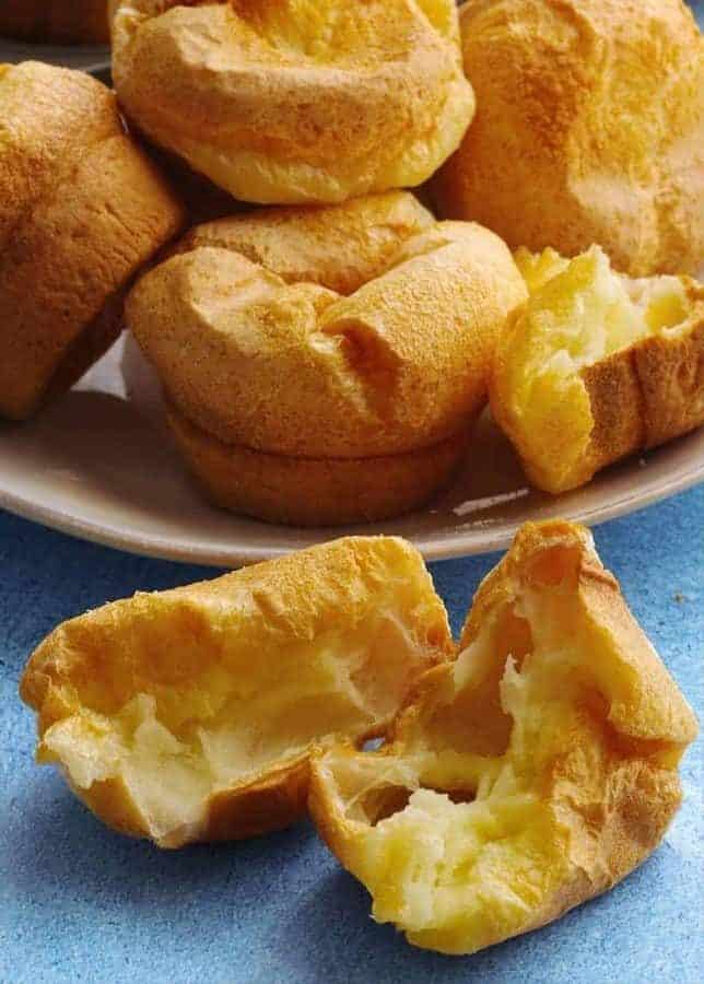 Instant Pot Pao de Quiejo to make the famous Brazilian cheese bread at home. This gluten-free delight is steamed and then broiled. Just tapioca flour, milk, oil, eggs, and cheese make up this delightful bread.