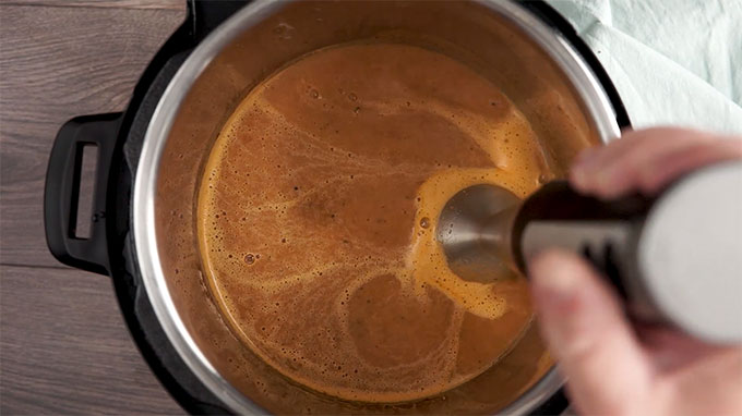 Overhead shot of pureeing the sauce for the Instant Pot Brisket.