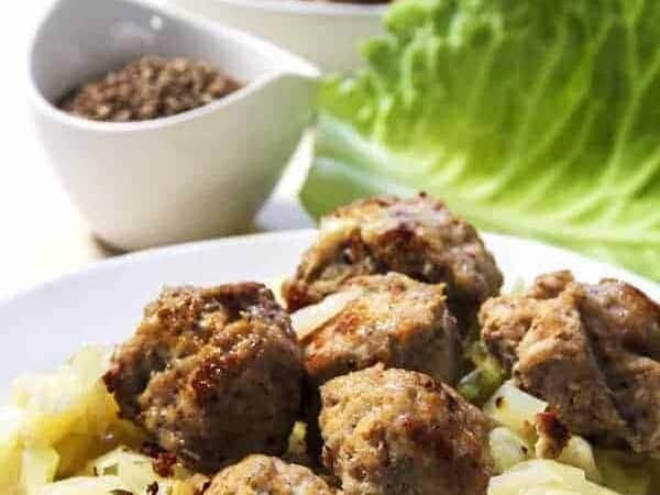 Homemade Instant Pot Low Carb Chicken Bratwurst and Cabbage dinner. This easy chicken sausage recipe makes meatballs that are very mildly spiced but flavorful, and sure to be very kid-friendly.