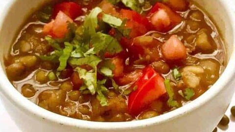 This recipe for Indian Vegan Whole Moong Dal cooks so fast in your pressure cooker or Instant Pot, that it makes this hearty, protein-rich dal easy to make for weeknight dinners. This recipe allows you to harness the power of your pressure cooker to skip several stovetop steps, without compromising flavor. 