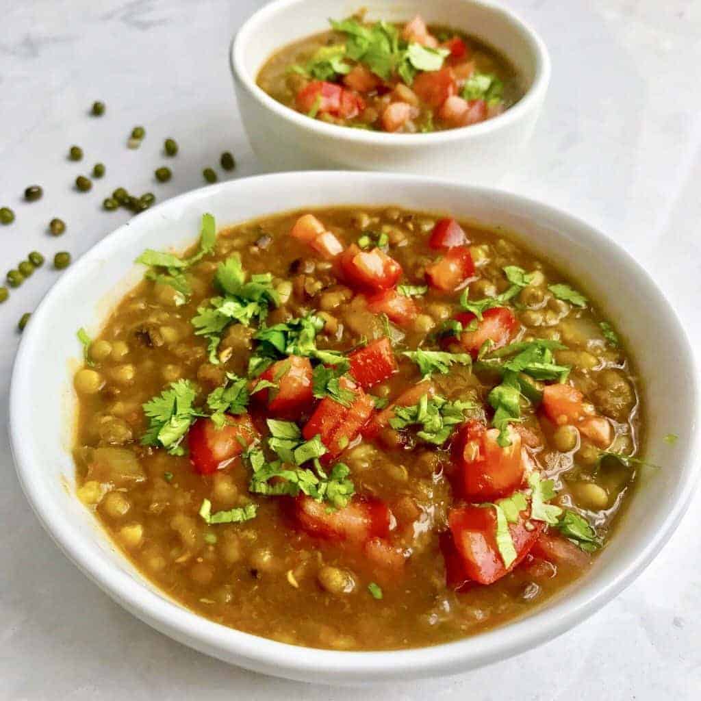 This recipe for Pressure Cooker Indian Moong Dal cooks so fast in your pressure cooker or Instant Pot, that it makes this hearty, protein-rich dal easy to make for weeknight dinners. This recipe allows you to harness the power of your pressure cooker to skip several stovetop steps, without compromising flavor. 