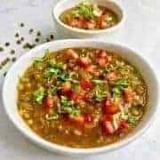 This recipe for Indian Moong Dal cooks so fast in your pressure cooker or Instant Pot, that it makes this hearty, protein-rich dal easy to make for weeknight dinners. This recipe allows you to harness the power of your pressure cooker to skip several stovetop steps, without compromising flavor. 