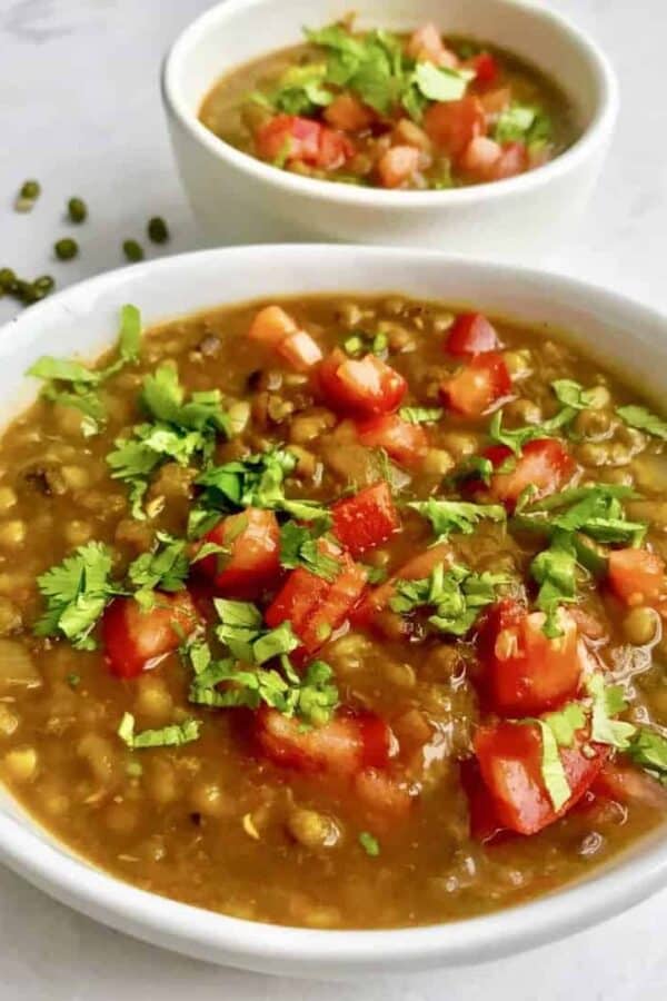 This recipe for Indian Moong Dal cooks so fast in your pressure cooker or Instant Pot, that it makes this hearty, protein-rich dal easy to make for weeknight dinners. This recipe allows you to harness the power of your pressure cooker to skip several stovetop steps, without compromising flavor. 