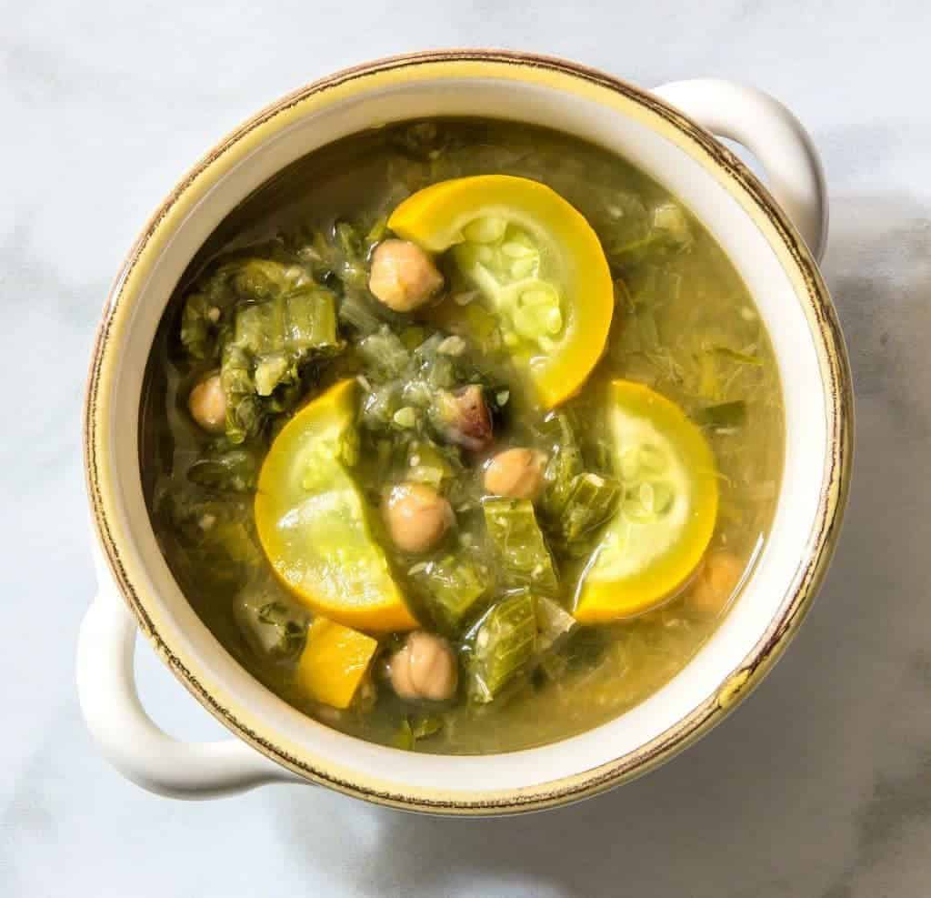 This summer soup is filled to the brim with chickpeas, rainbow chard, and yellow summer squash. Garlic and parsley give it it a fresh taste, for a soup everyone can enjoy.