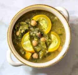 This summer soup is filled to the brim with chickpeas, rainbow chard, and yellow summer squash. Garlic and parsley give it it a fresh taste, for a soup everyone can enjoy.