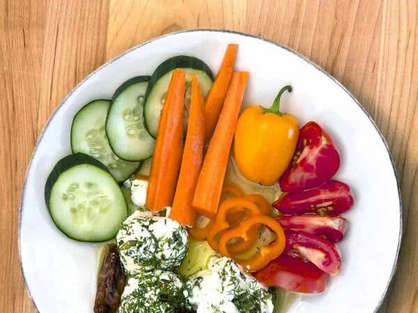 Labneh yogurt dill balls overhead with vegetables