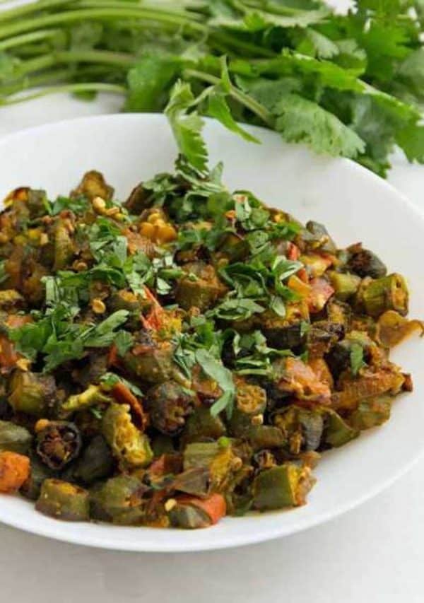 This recipe for Indian Bhindi Masala, or okra with onions and tomatoes, will be the easiest and most authentic recipe you will ever make. Make restaurant-style Bhindi Masala at home with very little effort. 