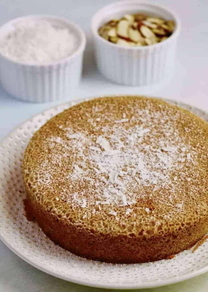 Instant Pot Keto Almond Coconut Cake on a plate.