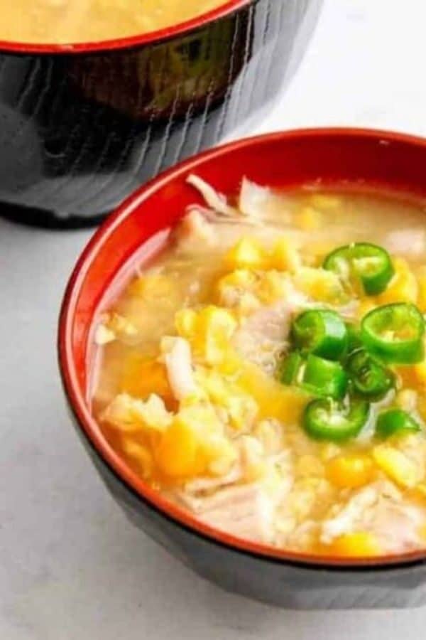 Sweet Corn Chicken Soup in a red bowl