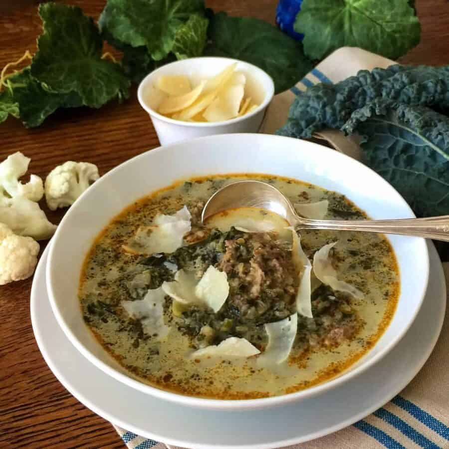 Low Carb Italian Sausage Kale Soup create a hearty, comforting low carb soup in your Instant Pot or Pressure cooker. Easy, delicious, freezes well.