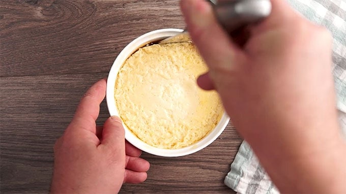 Unmold the caramel custard by running a knife along the edges