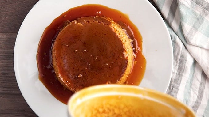 overhead shot of instant pot caramel custard topped with sauce