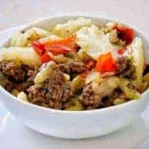 Pressure Cooker Low Carb Ground Beef Shawarma with vegetables is an easy, delicious, low carb one-pot meal for your Instant Pot that is flavorful, and super family-friendly. Overhead shot of shawarma in white bowl.