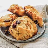 Use a little dried fruit and Carbquick to make a cross between scones and muffins that are sure to satisfy your sweet craving. These low carb scones scuffins are light, moist, and tasty.