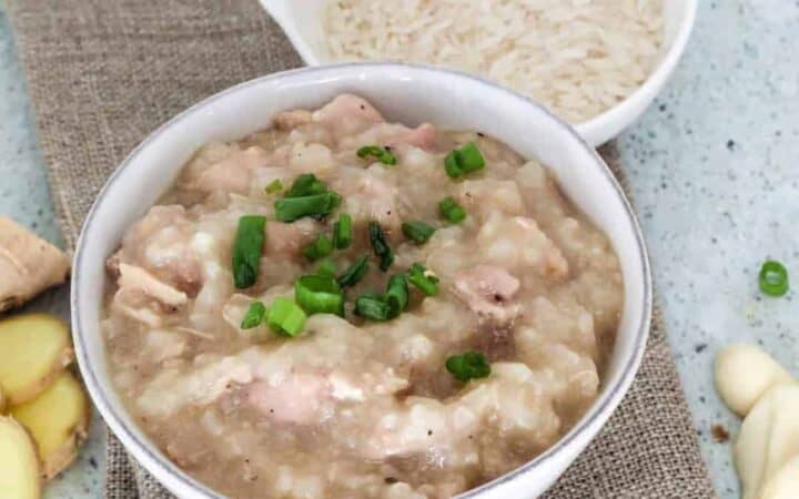 Simple and easy Hong Kong Style Instant Pot Chicken Congee is such a comforting dish on a cold day--or really any day at all. A few simple ingredients in your pressure cooker and you have a jook recipe that you can personalize and vary to your heart's content. 