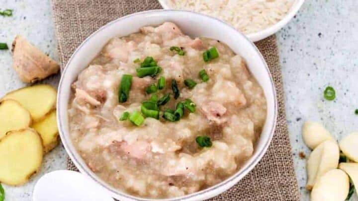 Simple and easy Hong Kong Style Instant Pot Chicken Congee is such a comforting dish on a cold day--or really any day at all. A few simple ingredients in your pressure cooker and you have a jook recipe that you can personalize and vary to your heart's content. 