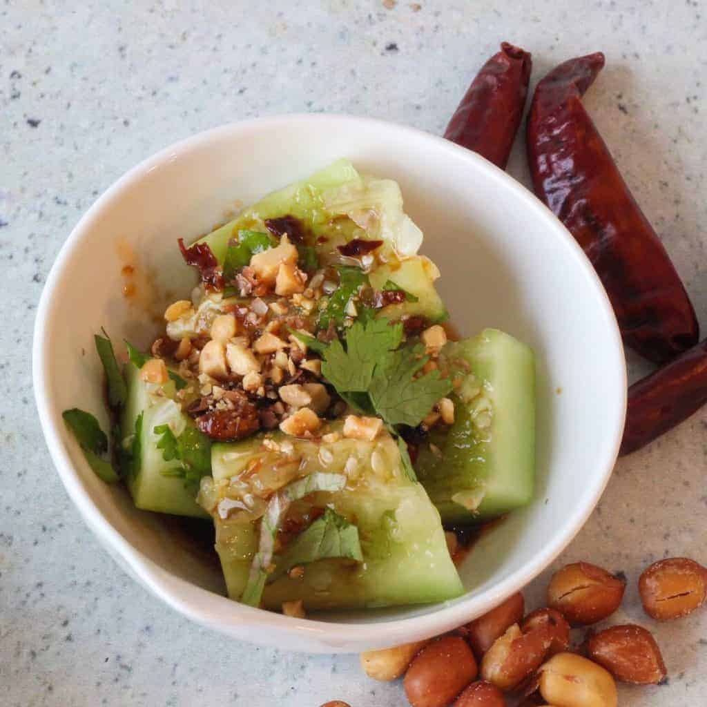 This Chinese Sichuan Smashed Cucumber Salad borrows from a Xi'an sauce I once had. Cucumbers, garlic, and a secret chili ingredient was what I used to recreate this crisp, cool, tangy, spicy marvel. Best of all? Done in about 8 minutes with this low carb, vegan marvel. 