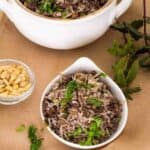 Lebanese hashweh combines ground meat and rice with pine nuts, allspice and other spices to make a wonderful side dish, or a flavorful stuffing for chicken or turkey. An easy one-step recipe can be made in a Pressure cooker, the Instant Pot Gem, or stovetop.