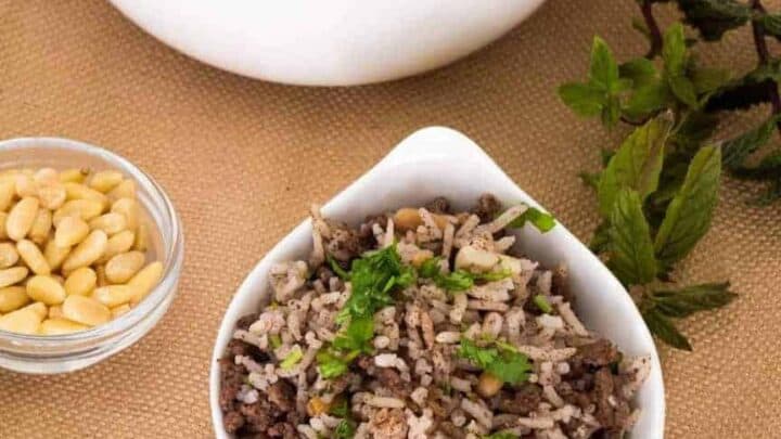 Lebanese hashweh combines ground meat and rice with pine nuts, allspice and other spices to make a wonderful side dish, or a flavorful stuffing for chicken or turkey. An easy one-step recipe can be made in a Pressure cooker, the Instant Pot Gem, or stovetop.