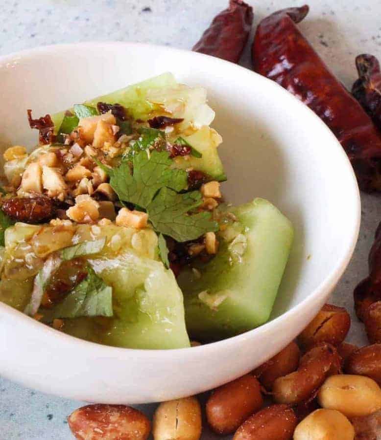 This Chinese Sichuan Smashed Cucumber Salad borrows from a Xi'an sauce I once had. Cucumbers, garlic, and a secret chili ingredient was what I used to recreate this crisp, cool, tangy, spicy marvel. Best of all? Done in about 8 minutes with this low carb, vegan marvel. 