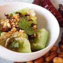 This Chinese Sichuan Smashed Cucumber Salad borrows from a Xi'an sauce I once had. Cucumbers, garlic, and a secret chili ingredient was what I used to recreate this crisp, cool, tangy, spicy marvel. Best of all? Done in about 8 minutes with this low carb, vegan marvel.