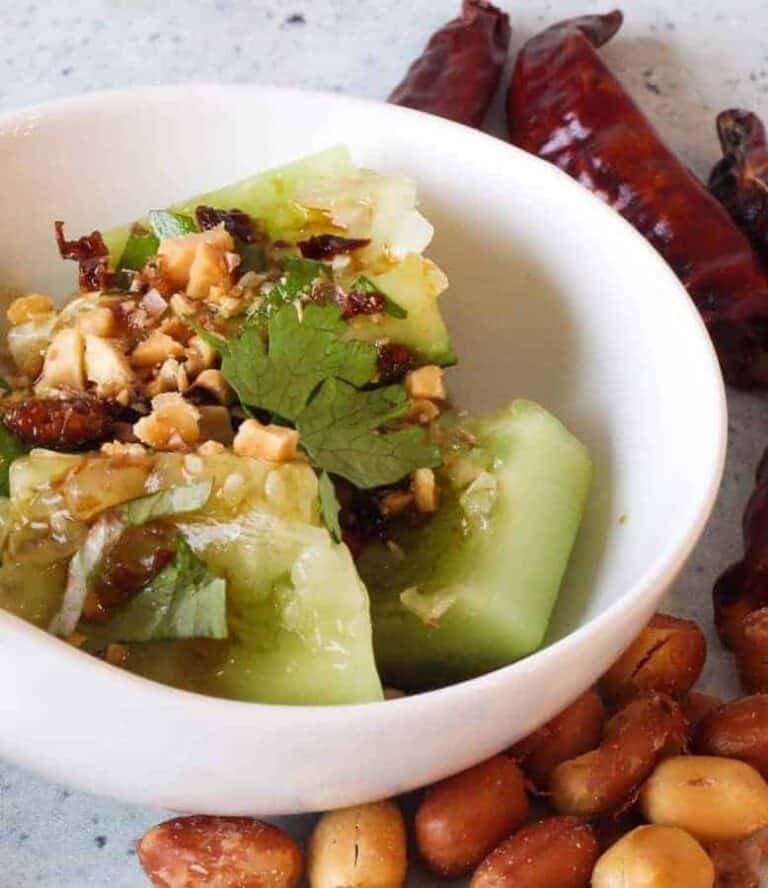 This Chinese Sichuan Smashed Cucumber Salad borrows from a Xi'an sauce I once had. Cucumbers, garlic, and a secret chili ingredient was what I used to recreate this crisp, cool, tangy, spicy marvel. Best of all? Done in about 8 minutes with this low carb, vegan marvel. 
