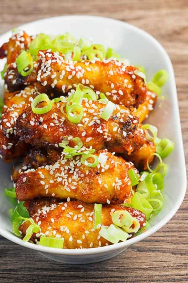 A plate of Gochujan Chicken Wings cooked in an Air Fryer.