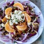 Pickled Red onion, Oranges salad with Feta cheese,  Mint, and cilantro. Date night food it is not. But let’s be honest. We’ve all been on dates we would have gladly traded for a salad. This would be that salad.