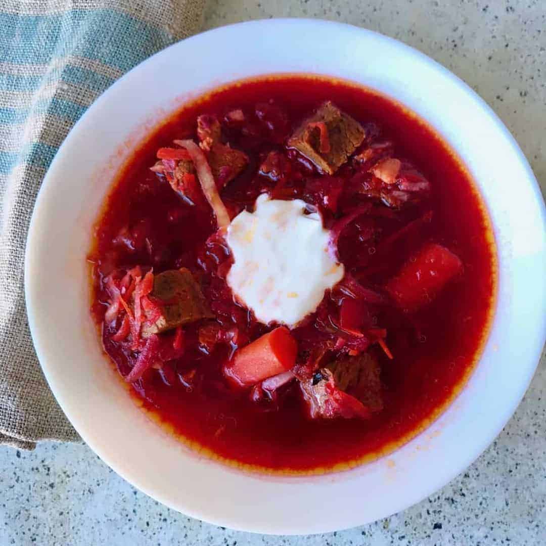 Classic Russian borscht recipe that has been simplified for your Instant Pot or pressure cooker, to give you the traditional taste you want, without spending half the day making this authentic Russian Borscht.
