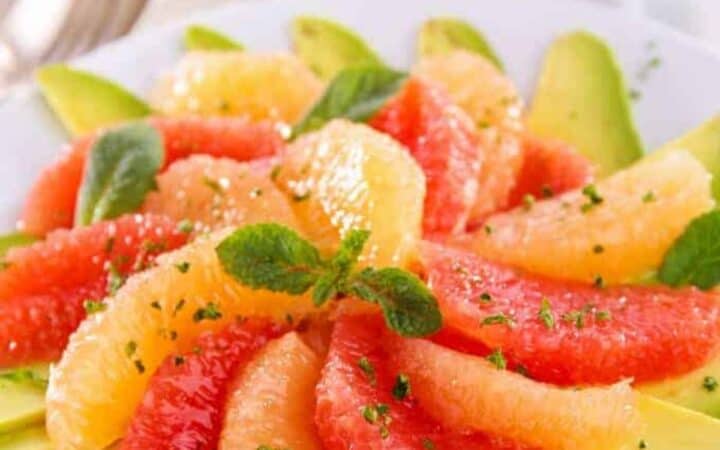Grapefruit salad served on a white plate