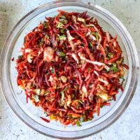 Overhead view of beet salad on a plate.