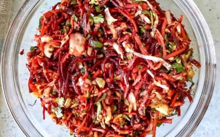 Overhead view of beet salad on a plate.