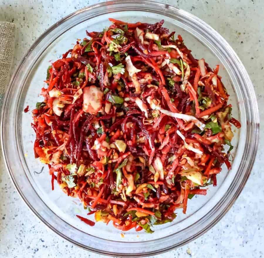 Overhead view of beet salad on a plate.