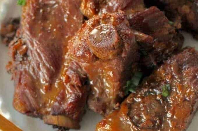 overhead view of braised spareribs with chopsticks