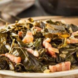 Collard Greens with Bacon on a white dish