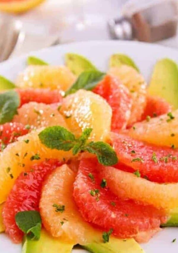 Grapefruit salad served on a white plate